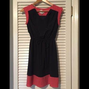 Navy blue dress with melon bottom. Ties at waist